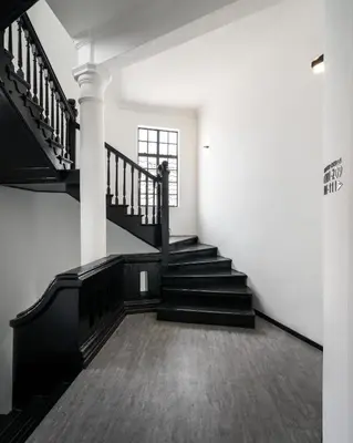 a staircase in a building with black and white at Modern Hotel Georgetown in George Town