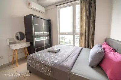 a bedroom with a large bed and a window at Seaview Mansion One Georgetown in George Town
