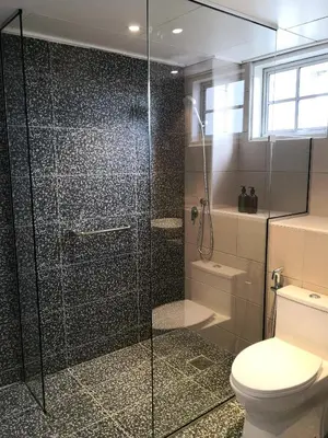 a bathroom with a shower and a toilet at The Hill at Fraser Hill in Bukit Fraser