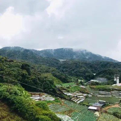 a view of a valley with a mountain in the background at Merlin Home@Crown Imperial Court in Tanah Rata