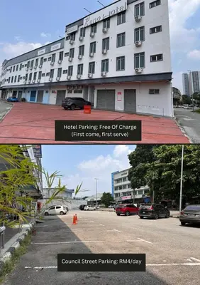 a building with a sign that reads hotel parking free of charge first come at Reno Hotel Ipoh in Ipoh