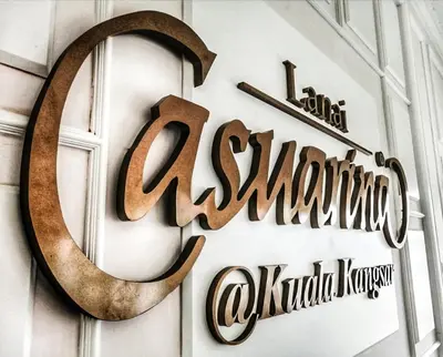 a sign for a restaurant with a crescent moon at Hotel Casuarina@Kuala Kangsar in Kuala Kangsar