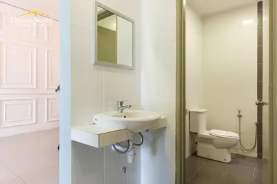 a bathroom with a sink and a toilet at Zetter Suites by Dreamscape in Cameron Highlands