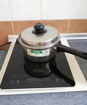 a pot sitting on top of a stove at Green View Home Cameron Highlands in Brinchang
