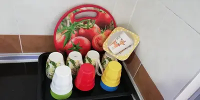 a black container filled with different colored plastic toys at Green View Home Cameron Highlands in Brinchang