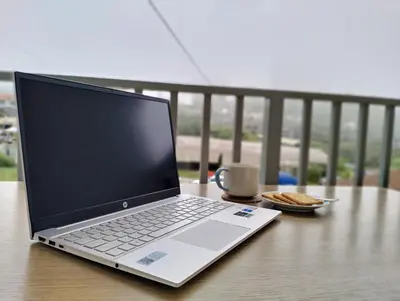 a laptop computer sitting on top of a table at Ng Family’s Farm Stay in Cameron Highlands