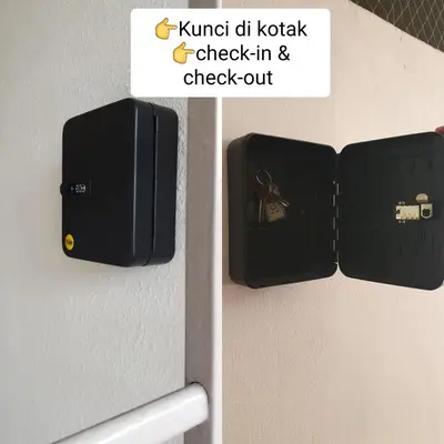 a picture of a lock on a bathroom door at VIP Suite Seaview Batu Ferringhi 1003-2 Bedroom in Batu Ferringhi