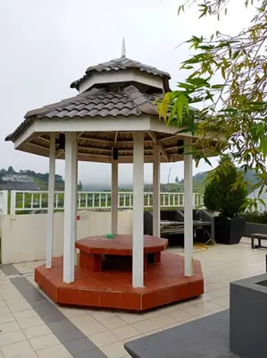 a gazebo with a picnic table in it at Bishops Cap at Cameron Highlands in Brinchang