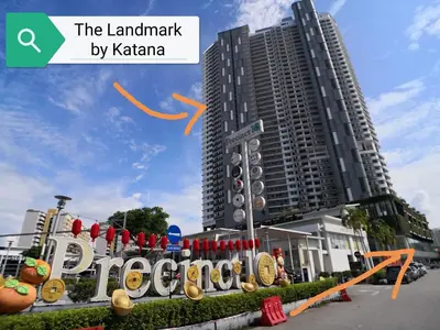 a sign in front of a tall building at Pulau Andaman Gurney Bay View The Landmark by Comfy in George Town