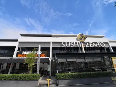 a sushiarma building with a sign on top of it at Pulau Andaman Gurney Bay View The Landmark by Comfy in George Town