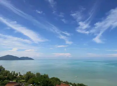 a view of the ocean under a blue sky at VIP Suite Seaview Resort Batu Ferringhi 1202 - 3 Rooms in Batu Ferringhi