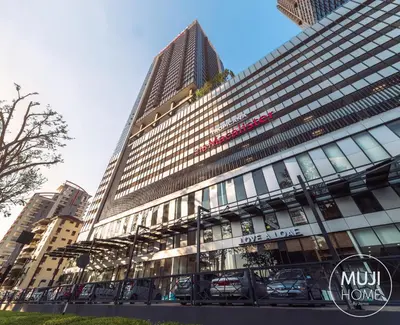 a tall building with cars parked in front of it at MUJI Studio 2 - Seaview at 218 Tropicana Near Komtar Food Heaven with Netflix & TV Box in George Town