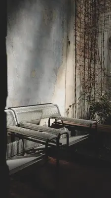an empty bed in a room with graffiti on the wall at Frenz Republic - SELF CHECK IN in George Town