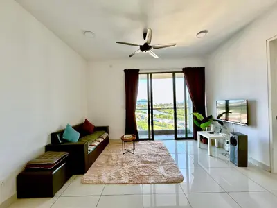 a living room with a couch and a ceiling fan at Entire Condominium @ Woodsburry Butterworth Penang in Butterworth