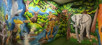 a mural on a wall with animals and plants at Winggarden Murals House by JE Boutique Guesthouse in Ipoh