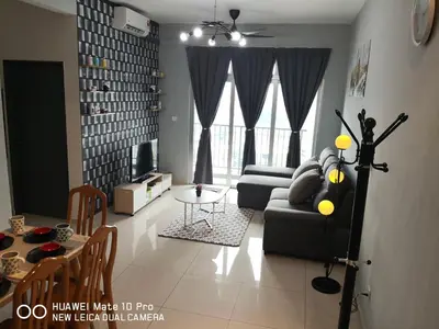 a living room with a couch and a table at Mcz homestay ipoh town 2room 7pax free wifi in Ipoh
