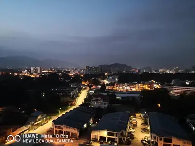 a view of a city at night with lights at Mcz homestay ipoh town 2room 7pax free wifi in Ipoh
