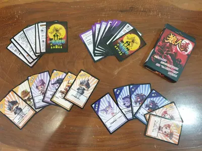 a table with a bunch of games on it at Taiping Cuti Homstay \u592a\u5e73\u7af9\u7b1b\u6c11\u5bbf 5mins to Kuala Sepetang in Taiping