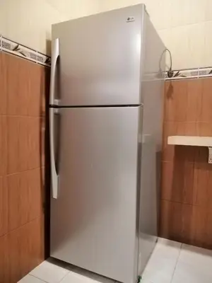 a stainless steel refrigerator in a kitchen at Green Hill Resort Tanah Rata 3R2B WiFi in Tanah Rata