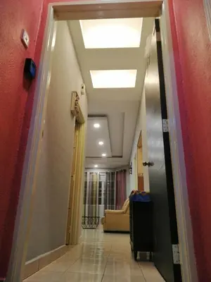 a hallway leading to a room with a ceiling at Green Hill Resort Tanah Rata 3R2B WiFi in Tanah Rata