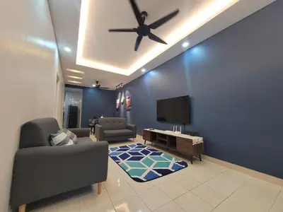 a living room with a ceiling fan and a tv at Ipoh Meru Modern Cozy Home NAZ IPOH HOMESTAY in Ipoh