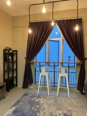 a room with two stools in front of a large window at LOVE LODGE BRINCHANG, CAMERON HIGHLANDS in Tanah Rata