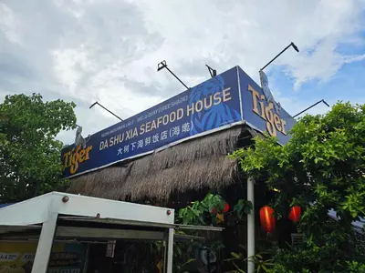 a blue sign on the top of a store at Room at Lebuh Armenian Georgetown City Center in George Town