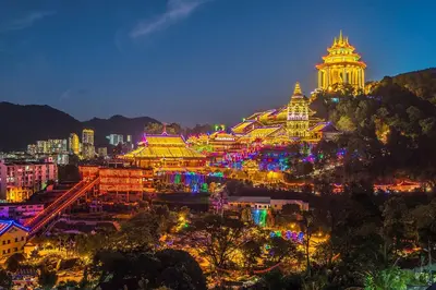a city lit up at night with a building at Kingston Hotel 13 - Penang Hills formerly known as Deview Hotel in Ayer Itam