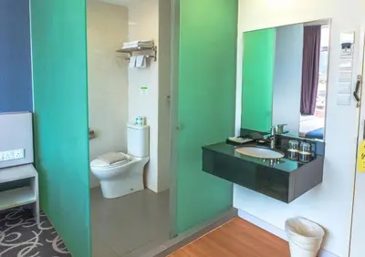 a bathroom with a sink and a toilet at Kingston Hotel 13 - Penang Hills formerly known as Deview Hotel in Ayer Itam