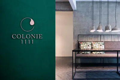 a store with a green wall with a clierine iii sign at 80 Colonie Fraser's Hill 8pax in Bukit Fraser