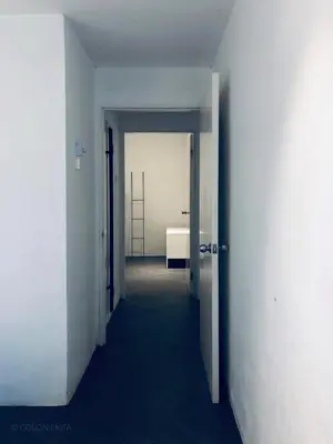 an empty hallway with a door leading to a bathroom at 80 Colonie Fraser's Hill 8pax in Bukit Fraser