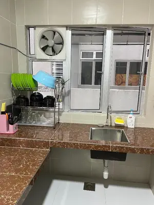 a kitchen counter with a sink and a window at Cameron Emerald Avenue @ Brinchang in Cameron Highlands