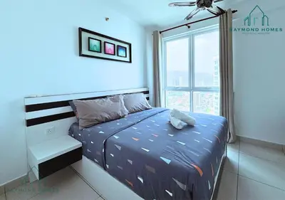 a bedroom with a bed and a window at Gurney Drive Mansion One Serviced Apartment in George Town