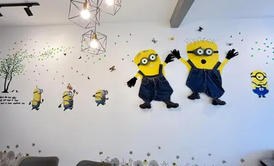a wall mural of three minions in a room at FuYoke Emerald Avenue @ Brinchang in Cameron Highlands