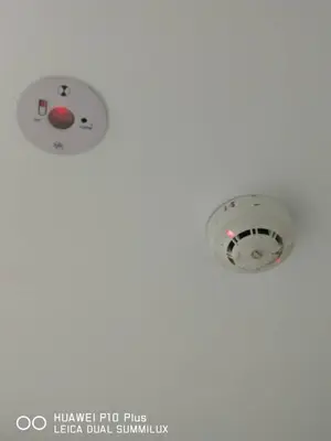 a ceiling light in a room with aperature at Grand Bagan Hotel in Butterworth