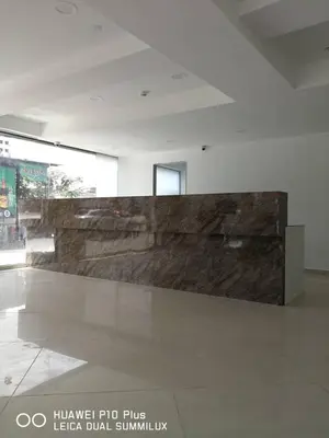 a large stone wall in a large room at Grand Bagan Hotel in Butterworth