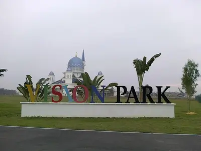 a sign for a park with a building in the background at Homestay D'Bertam, Kepala Batas, Penang, Muslim Saja in Kepala Batas