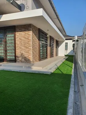 an image of a house with green grass at Homestay D'Bertam, Kepala Batas, Penang, Muslim Saja in Kepala Batas