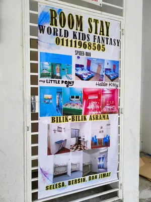 a poster for a room stay world kids fantasy exhibition at WORLD KIDS FANTASY in Lumut