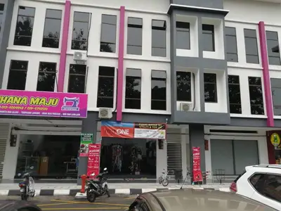 a building with a car parked in front of it at WORLD KIDS FANTASY in Lumut
