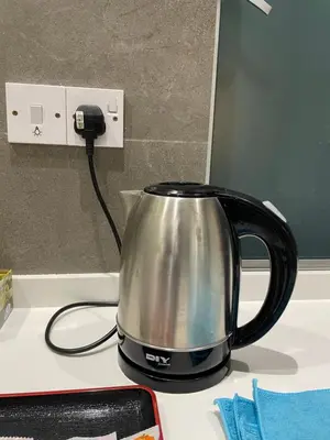 a black and silver kettle sitting on top of a counter at The Quintet Cameron Highlands by Tulip in Tanah Rata