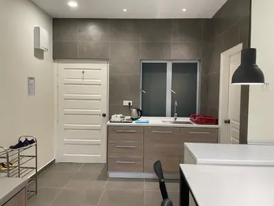 a kitchen with a sink and a counter top at The Quintet Cameron Highlands by Tulip in Tanah Rata