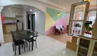 a kitchen and dining room with a table and chairs at Unicorn Homestay @ Cameron Highland in Tanah Rata