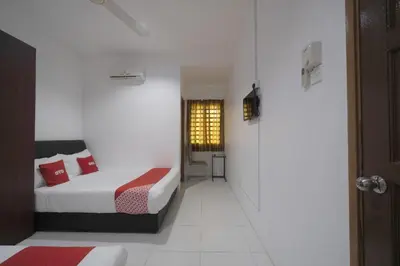 a small room with a bed and a window at Guesthouse Fasa 2B in Seri Manjung
