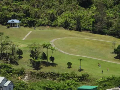 an aerial view of a park with people in it at Bugdet Apartment in Brinchang