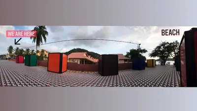 a bunch of different colored boxes on a street at Pangkor Coralbay Resort 201 apartment in Pangkor