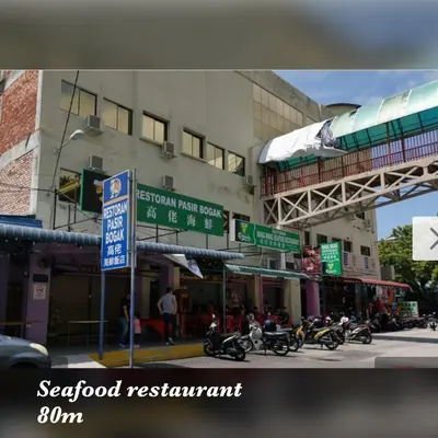 a group of motorcycles parked in front of a building at Pangkor Coralbay Resort 201 apartment in Pangkor