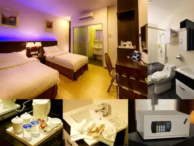 a hotel room with two beds and a bathroom at ERNES Hotel Alma Bukit Mertajam in Bukit Mertajam