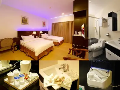 a hotel room with two beds and a sink at ERNES Hotel Alma Bukit Mertajam in Bukit Mertajam