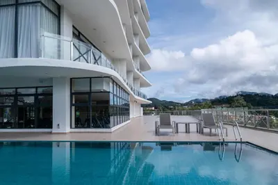 a view of a building with a swimming pool at Zenith Hotel Cameron in Tanah Rata